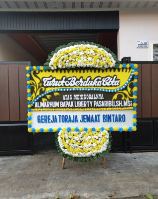 Papan Bunga Duka di Sidoluhur